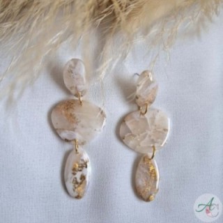 Charlotte Blanco y tierra